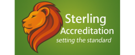 Logo of Sterling Accreditation on a green background, featuring a stylized orange lion profile and the motto "setting the standard" in white text.